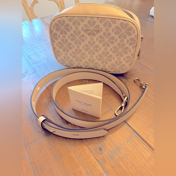 kate spade Handbags - Kate Spade Signature Flower Mini Crossbody Soft Pink. NWOT.